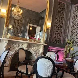 a dining room with a fireplace