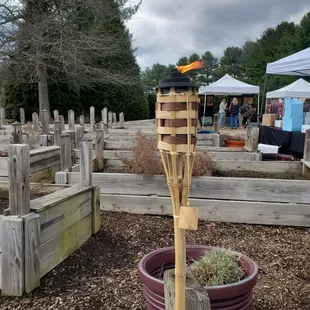 a birdhouse in a garden