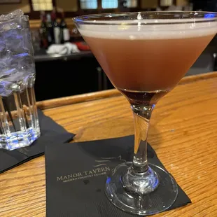 a cocktail in a martini glass