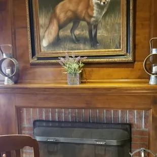 East dining room with fireplace