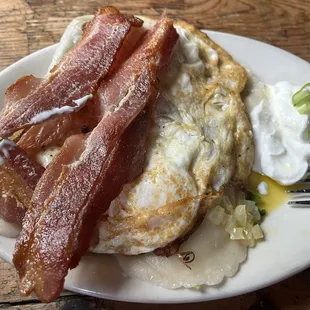 Do NOT understand this plating. Buried under here are the pierogis. Why pile food on top of each other when can use a bigger plate?