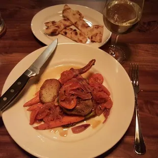 Thick-Cut Pork Chop with apricot chutney, crispy potatoes, and seasonal veggies (which was carrot spears).