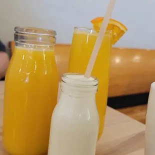 two jars of orange juice