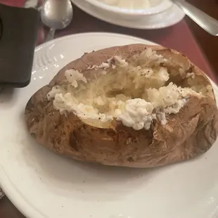 Baked potato with butter and sour cream