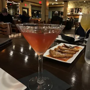 a martini and pastries