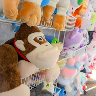 a rack of stuffed animals