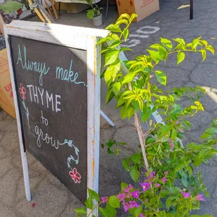 a chalk board with a sign that says why make thyme