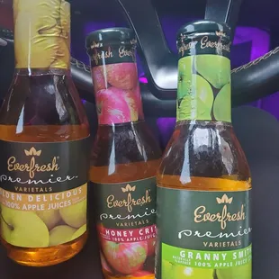 three bottles of apple cid
