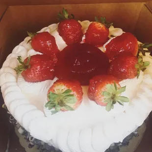 a cake with strawberries on top