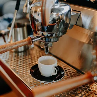 a cup of coffee being made