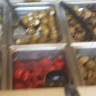 a display of different types of olives