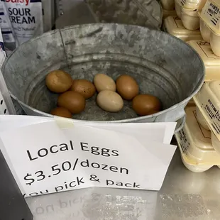 a bucket of eggs on display