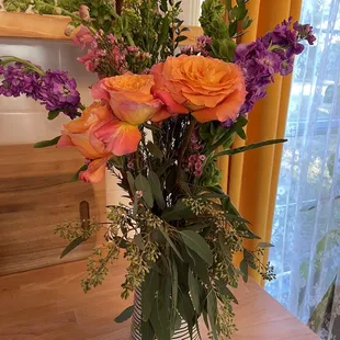 a vase of flowers on a table