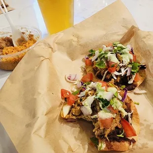 2 Carnitas tostdas side of rice and beans &amp; draft