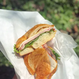 Custom sandwich (ham, Muenster cheese, lettuce, and Mayo on a croissant)