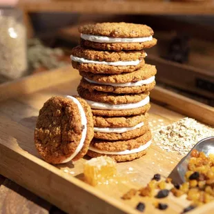 a stack of cookies on a cutting board