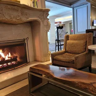 a fireplace in the lobby