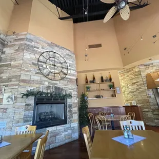 a fireplace and dining area