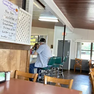 a man sitting at the counter