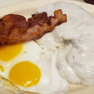 1/2 gravy biscuit and eggs and bacon