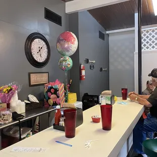 a man sitting at the counter