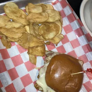 Ham and Swiss on brioche bun with a fried egg