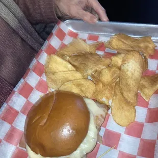 Ham and Swiss on brioche bun with a fried egg