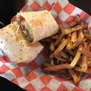a burrito and french fries