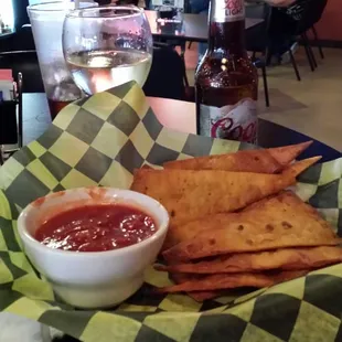 The chips and salsa. (Tomato basil chips) at The market vines wine bar and grille.