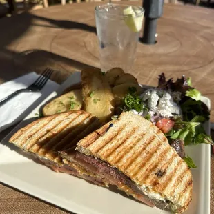 Avocado panini with medium steak
