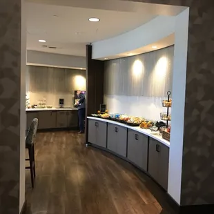 a man preparing food in a cafe