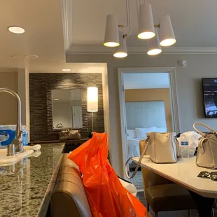 Bar area, kitchen, bedroom