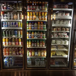 a refrigerated display of beverages