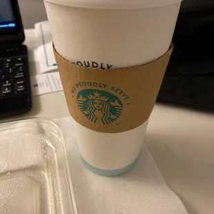 a cup of coffee and a fork