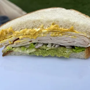 Christopher Columbus Sandwich. Turkey and avocado dominate.