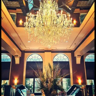 A lovely chandelier hovers over the main lobby
