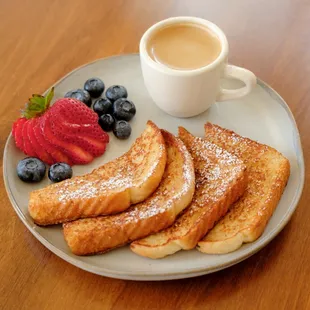 French toast serviced with fresh fruit and our specialty espresso.