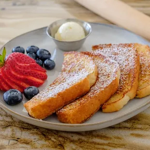 Our buttery, fluffy french toast made from scratch. Served with a side of fresh fruit and butter.