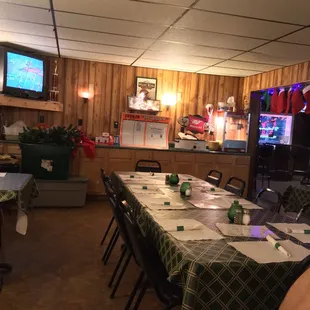 a dining room with tables and chairs