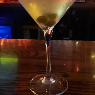 a martini with olives in it