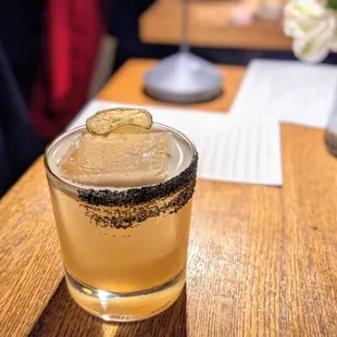 a cocktail in a glass on a table
