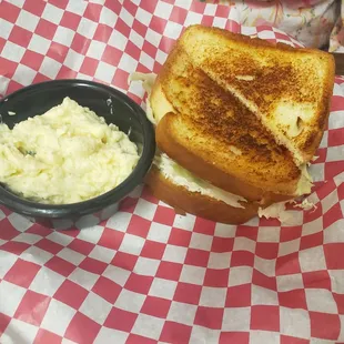 Chicken salad sandwich with potato salad