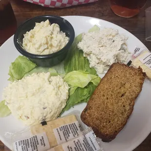 Triple salad plate (egg salad, potato salad, chicken salad, and slice of zucchini bread)