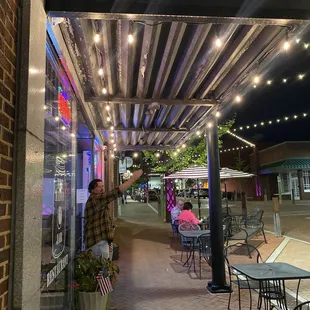 Who wants to sit under the lights of Trade street and enjoy great food and drinks
