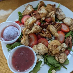 Skinny Salad - grilled chicken, on spinach, and fruit, feta, raspberry vinaigrette.