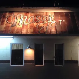 the outside of a restaurant at night