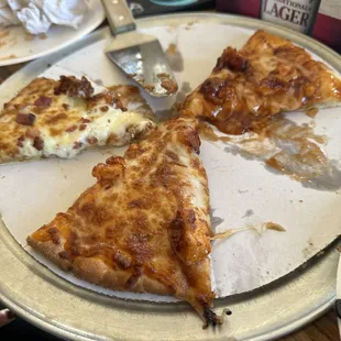 three slices of pizza on a plate