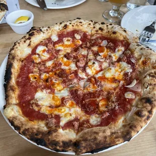 Sausage and Chile pizza - tomato, garlic, shallot, sausage, Calabrian chili, fontina