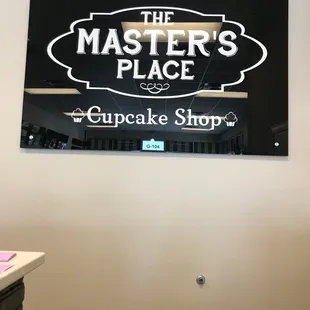 a sign for a cupcake shop