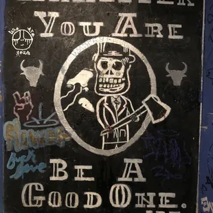 a sign that says whatever you are be a good one